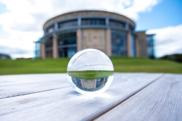 Gateway building seen through a prism.