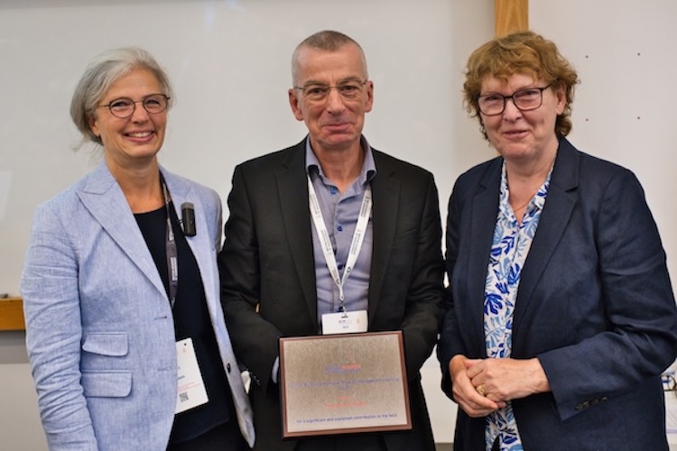 Professor Hibbert with Professor Katy Mason (President of the British Academy of Management), left and Trudi Wakeman