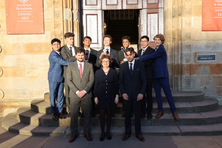 Members of the winning Reading School Ethics Cup team with Principal and Vice-Chancellor Professor Dame Sally Mapstone DBE FRSE (front, centre) at the University of St Andrews, 28 April 2026. Pictured: Mickhail Cajigal, Aashmit Ghosh, George Goodman, Jamin Hill, Jaden Le, Tejas Pahwa, Sumi Sakthivel, Remi Shehab, and Indiana Storm.