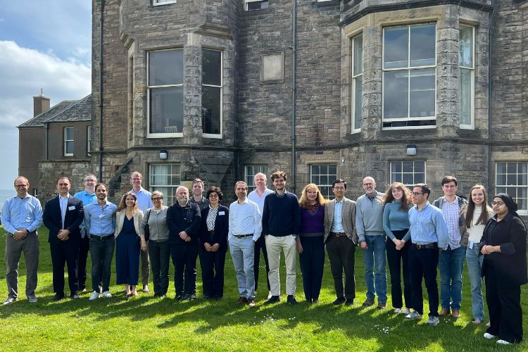 Participants at the second St Andrews Workshop in Macroeconomics gathered outside Castlecliffe, home of the Business School's Department of Economics