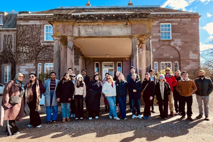 Business School PGR students outside The Burn during the School's annual postgraduate research retreat.